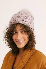 winter hat with short curly hair girl